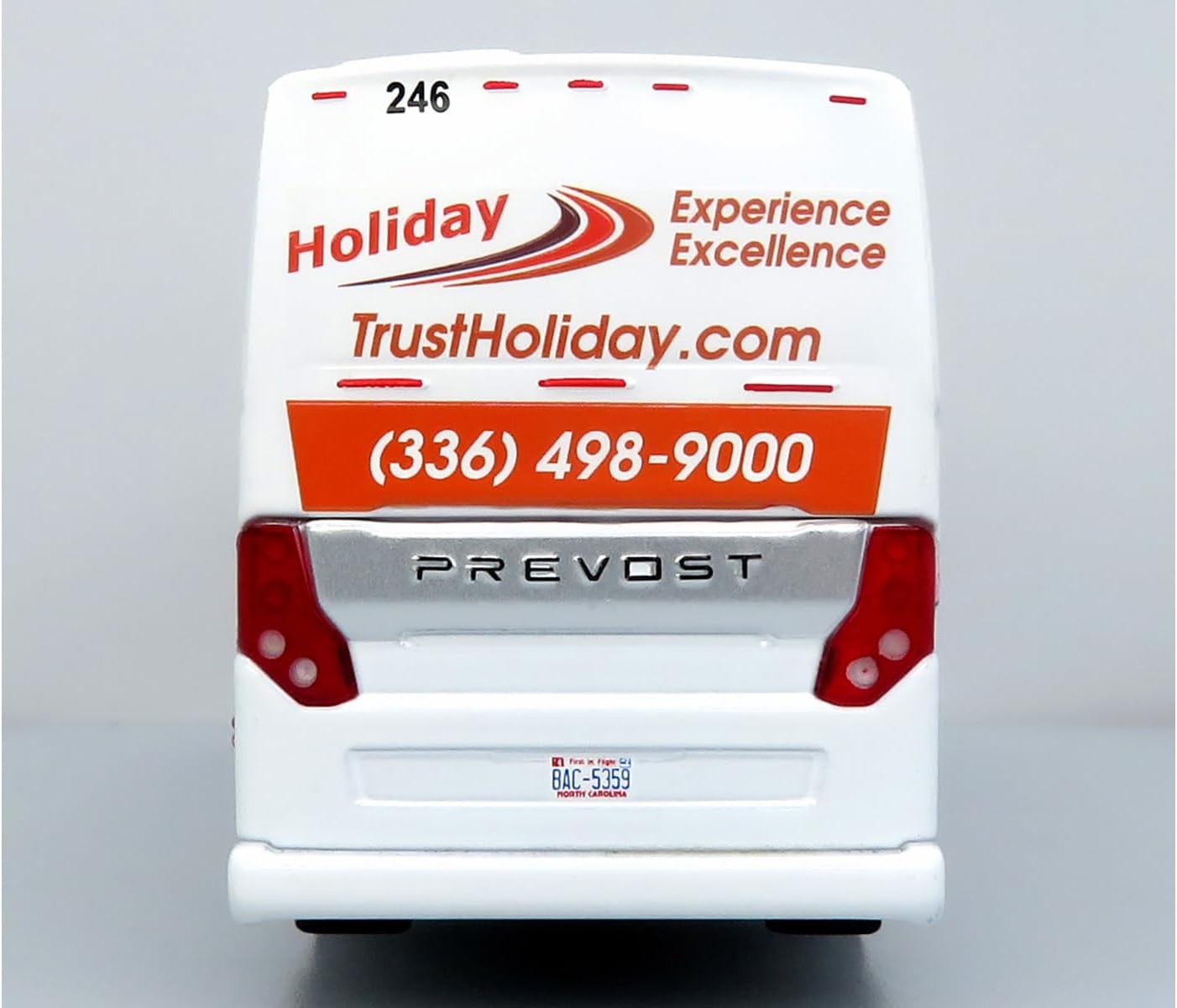 H3-45 Bus Holiday Tours - 2024 IMG Operator of The Year White with Graphics Limited Edition 1/64 Diecast Model 64-0615
