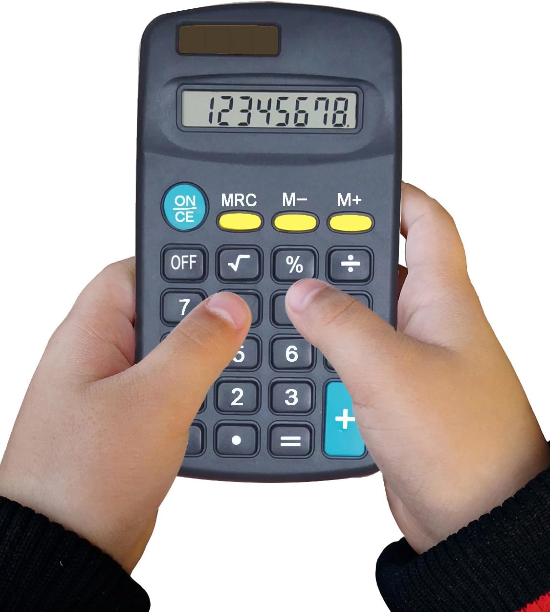 Child's hands operating the calculator