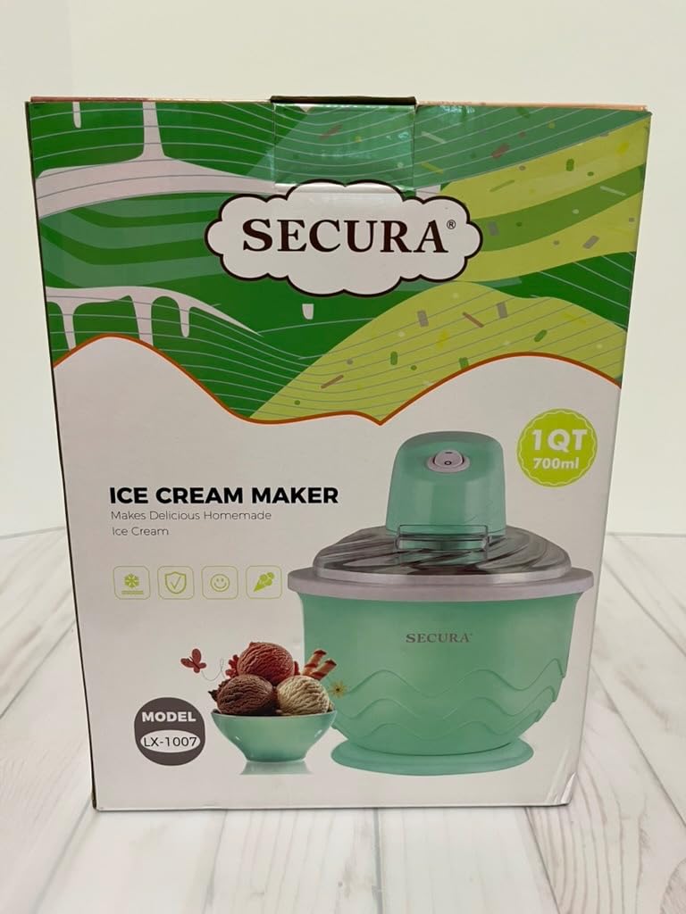 A hand shaking the frozen ice cream maker bowl to check if it's properly frozen. No sound means it's frozen.