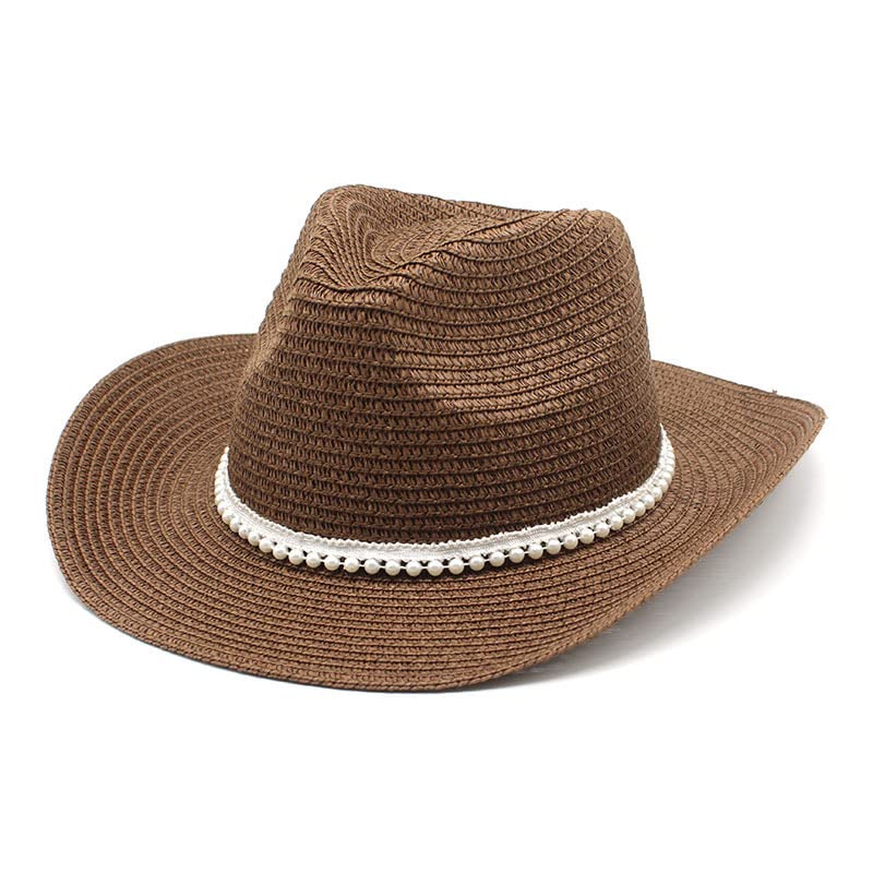 Chapeau de cowboy en paille contre le soleil d'été à grand bord marron