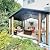 Sunjoy 11 x 13 ft. Hardtop Gazebo Outdoor Cedar Frame Wood Gazebo with Black Steel Hardtop Roof for Patio, Garden, Backyard, and Lawn Activities by SummerCove