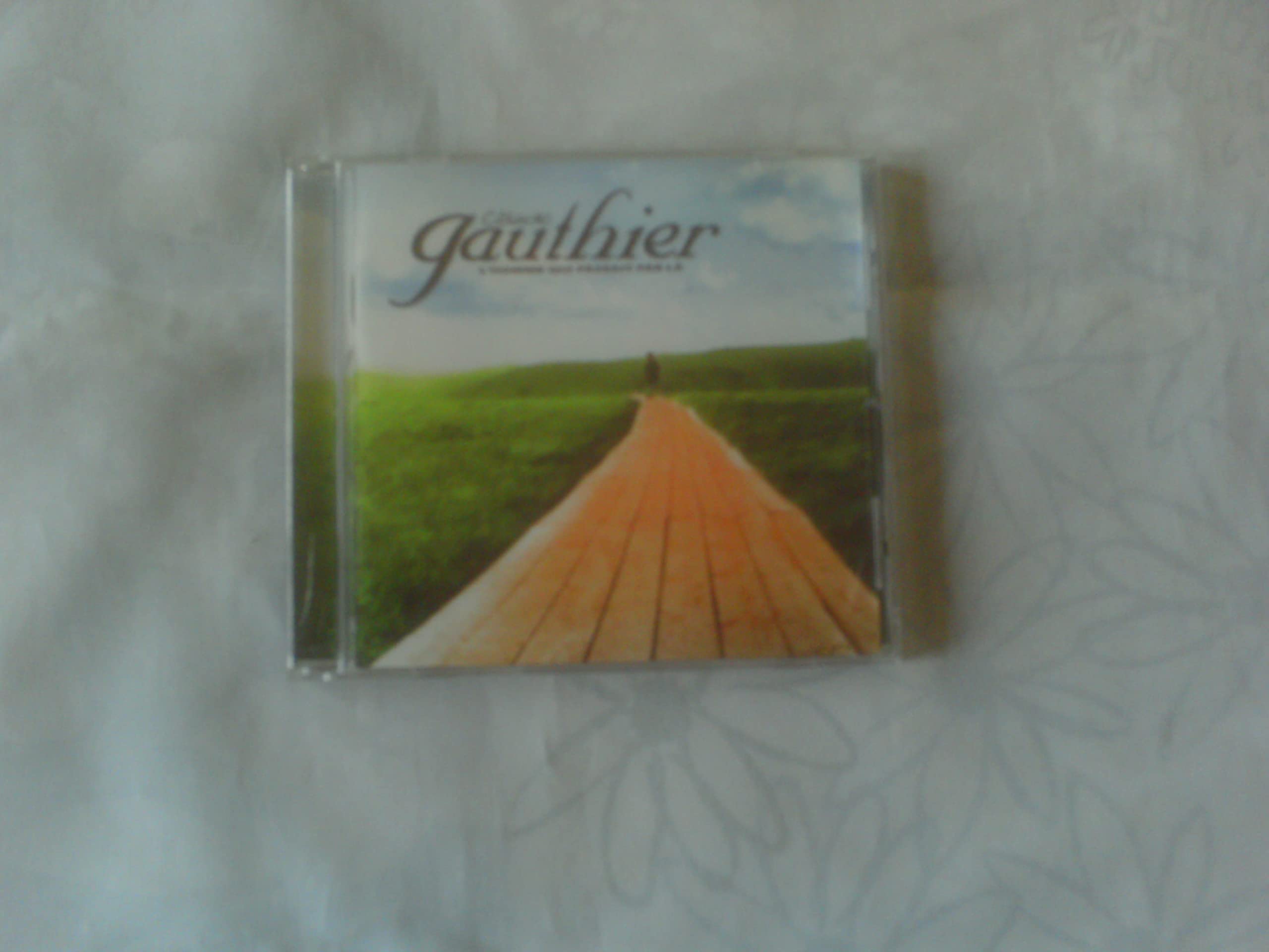 Homme Qui Passait Par la [Audio CD] Claude Gauthier and Danielle Bolduc