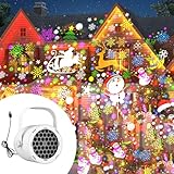 Décorations de Noël : le projecteur de projection de Noël projette des motifs festifs sur les murs et les plafonds, favorisant un environnement de prise de photos joyeux.