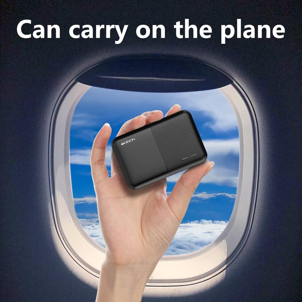 YOBON power bank held up to an airplane window, indicating it is safe for air travel.