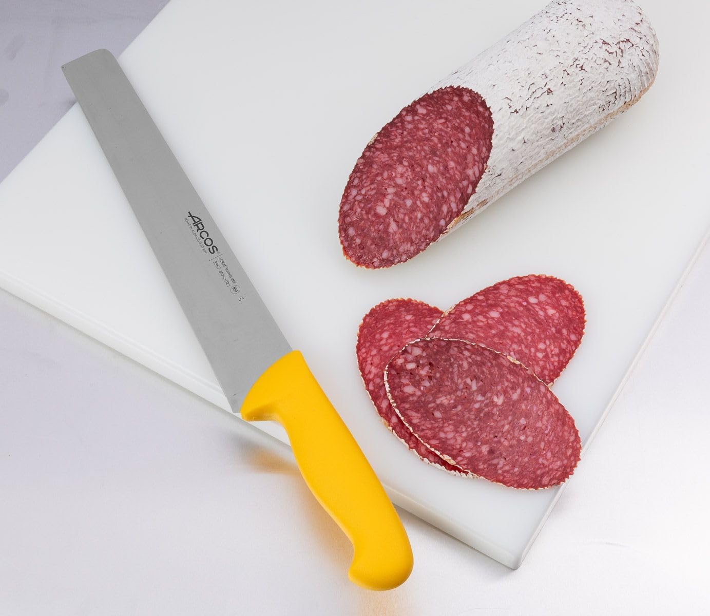 Arcos Salami Knife 12 Inch Nitrum Stainless Steel and 300 mm blade. Ergonomic Polypropylene Handle. Series 2900. Features different handle colors to make it easier for each food group. Color Yellow.