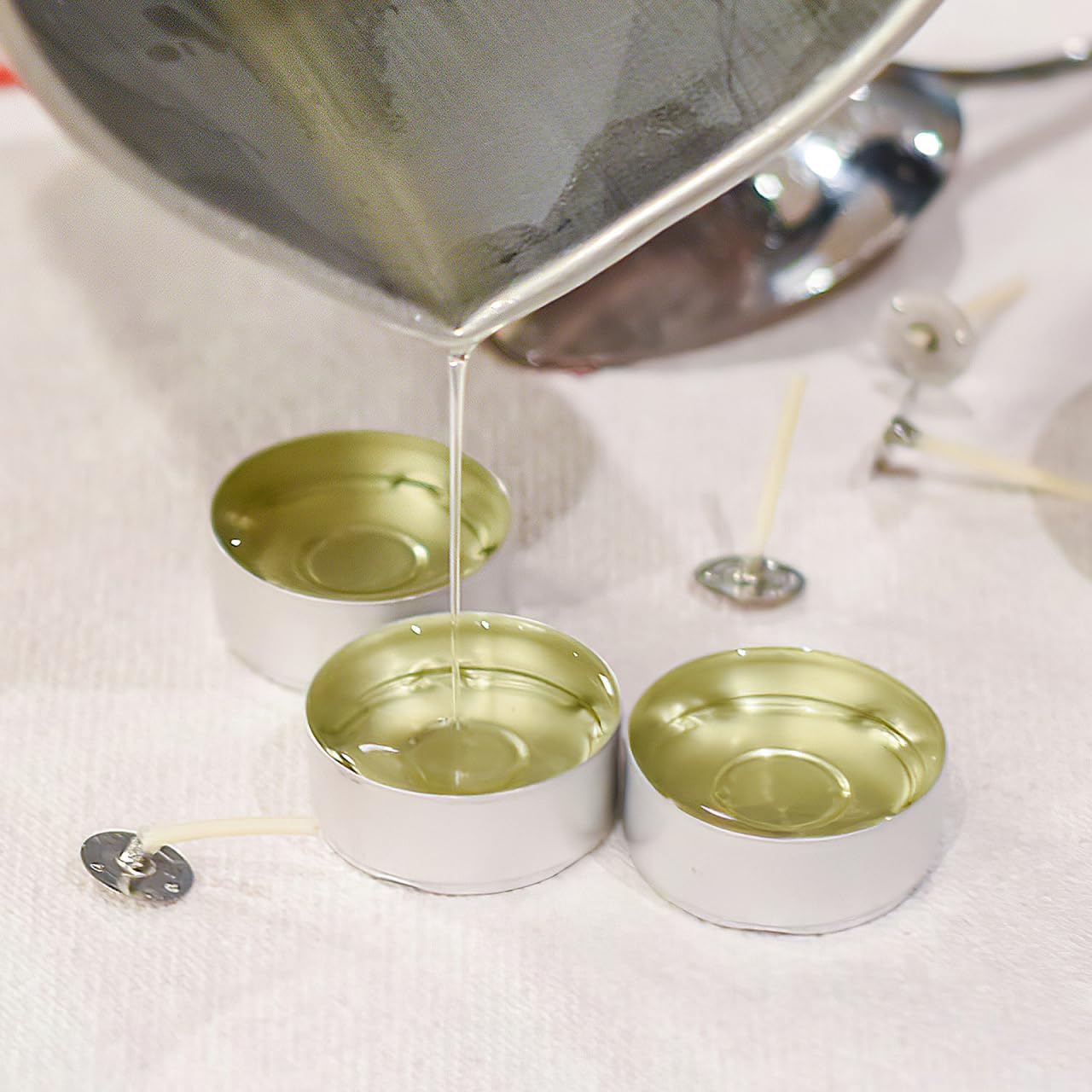 DOITOOL 150 Pcs Aluminum Tea Light Candle Tins with 1.0 Inch Candle Wicks Empty Round Metal Holders for DIY Making Wedding Holiday and Home Decoration