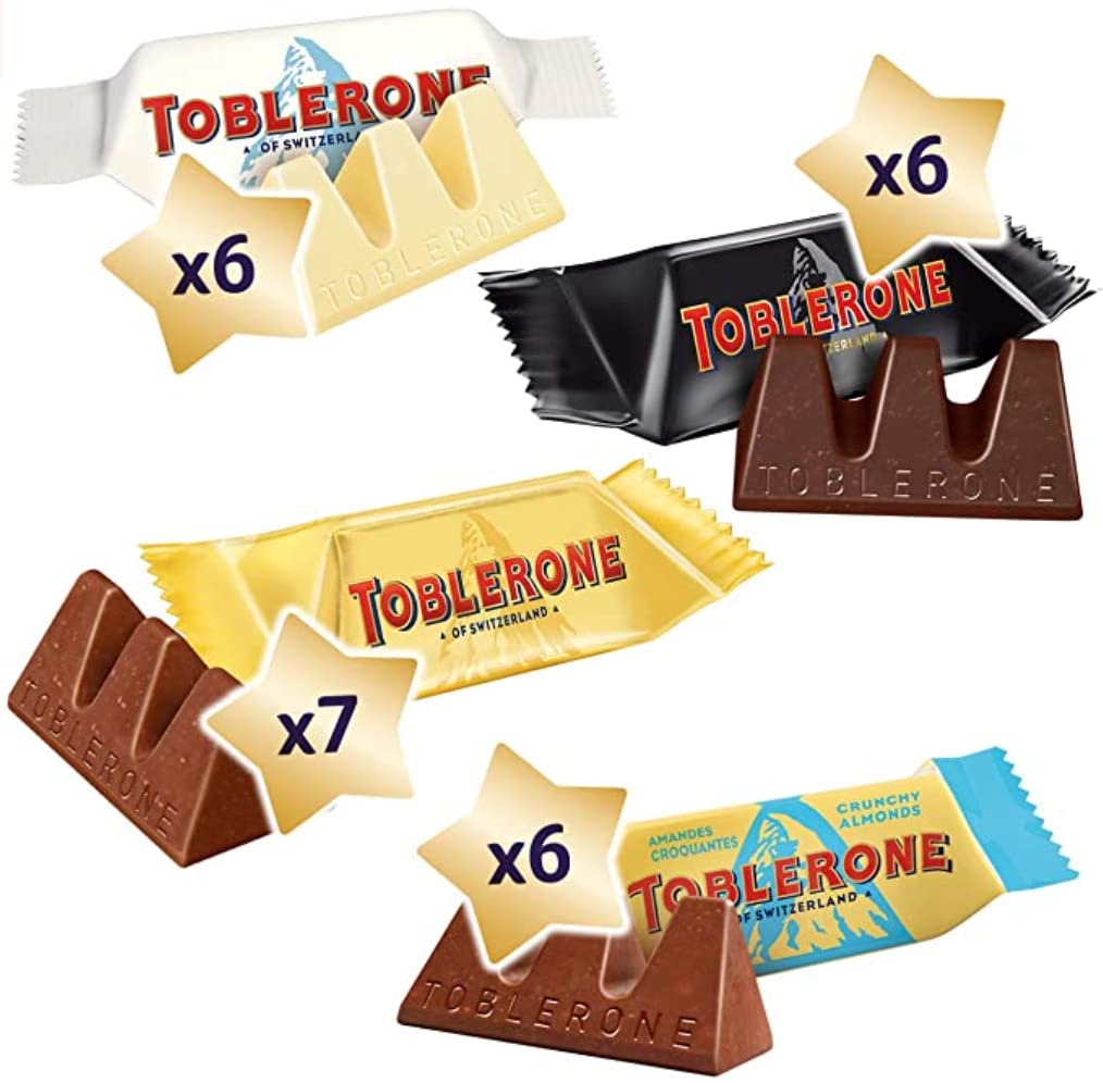 Toblerone Calendario de Adviento de 200 g, surtido de chocolates suizos, viene con sombrero de Navidad.