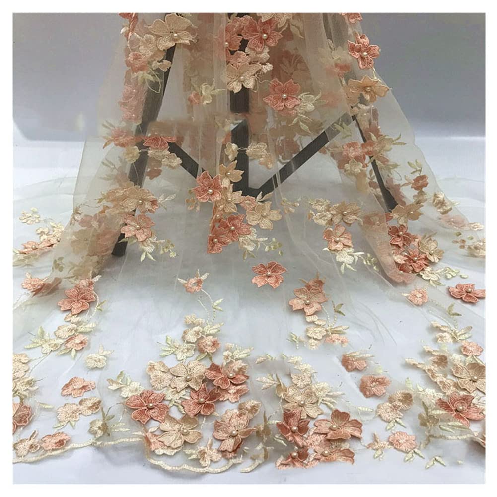 Tissu brodé 3D en tulle orange pour imaginer votre robe de mariée de rêve