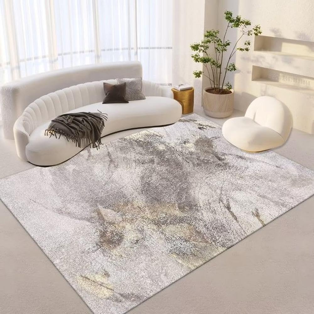 Tapis gris doux pour salon chaleureux et coin lecture sous la chaise
