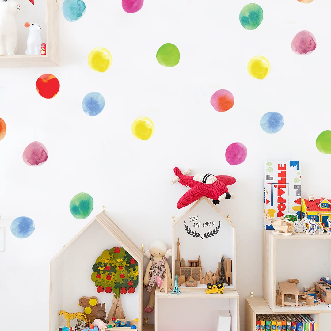 Stickers muraux pois aquarelle pour créer un espace de jeu coloré dans la chambre enfant