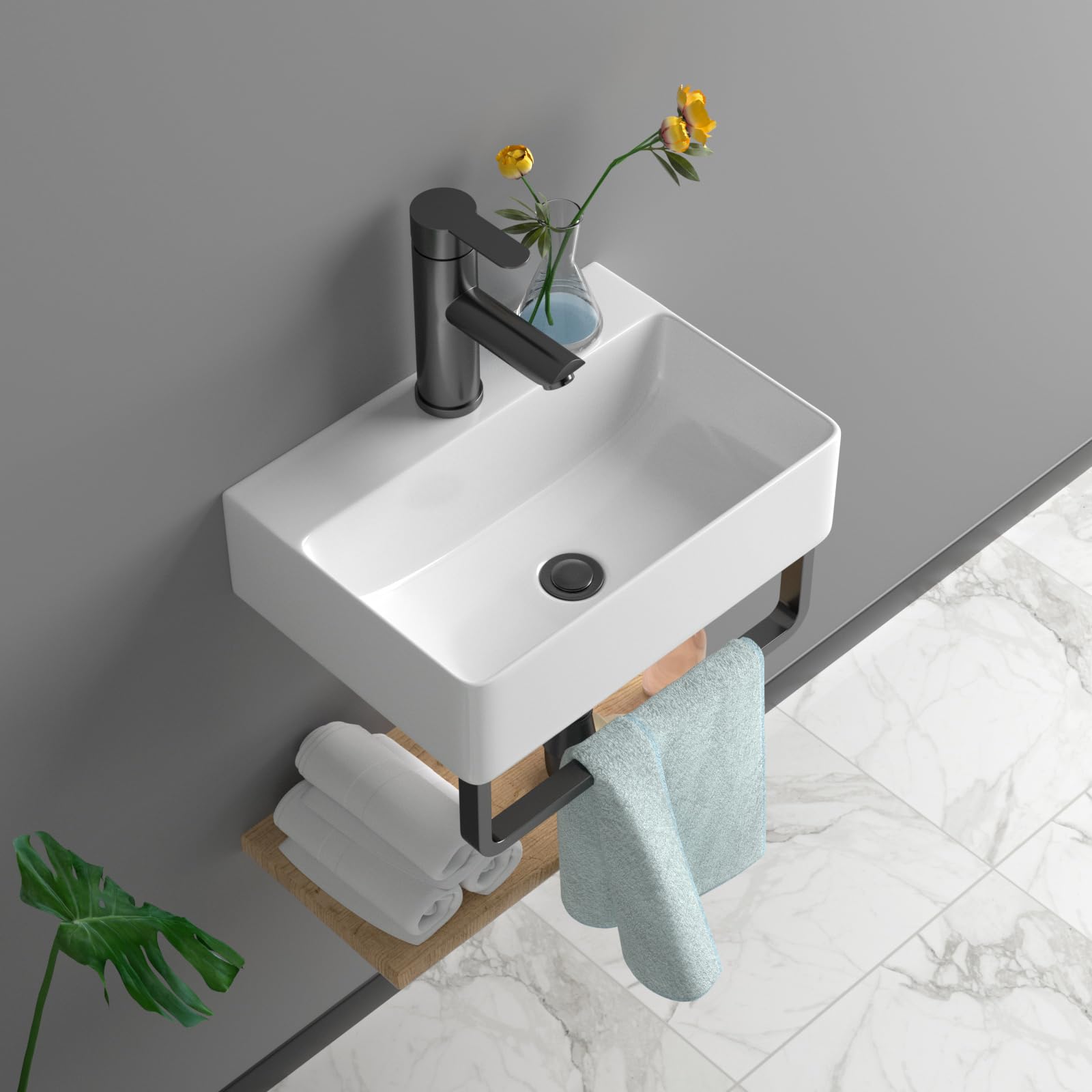 Lavabo de cerámica para pared con grifo negro que ahorra espacio en baños pequeños