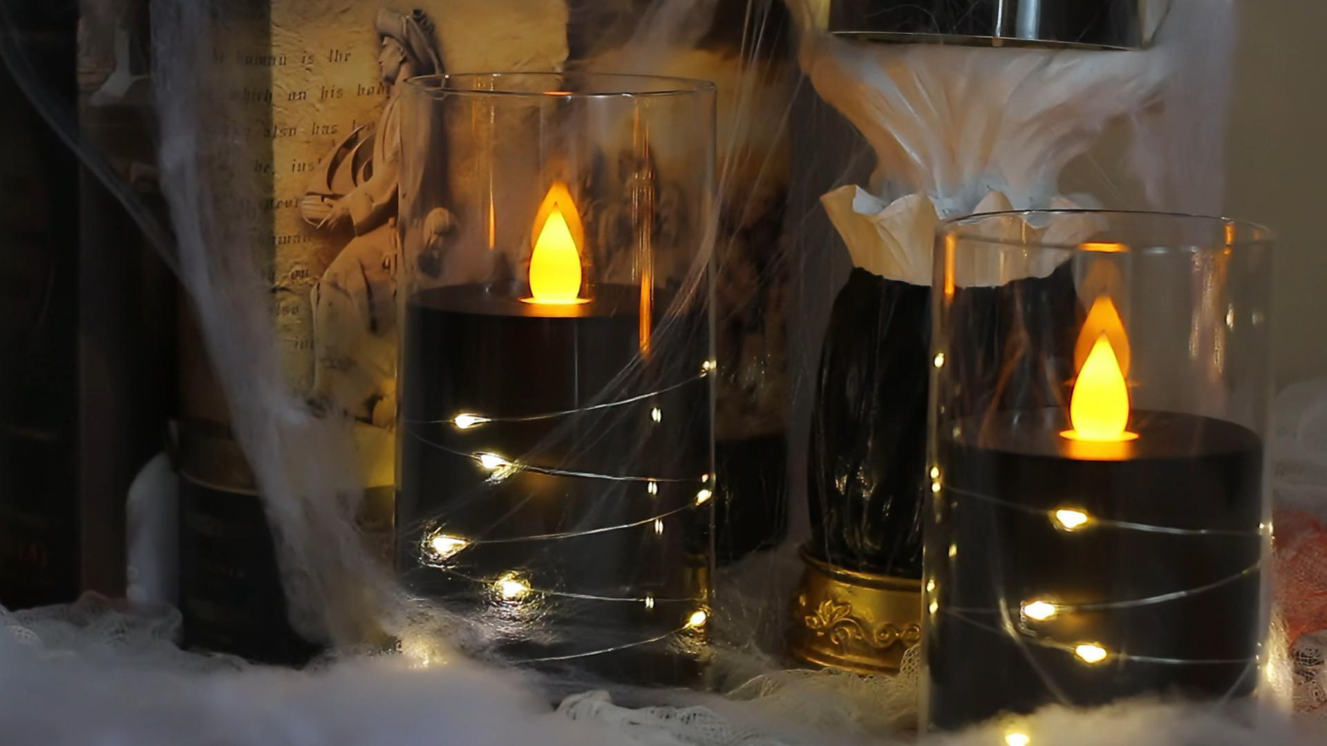 Image of Flameless Flickering 3 inch x4 inch 5 inch 6 inch Clear Plastic Black 11-Key Remote Candles with Light Strings, LED Battery Operated Cycle Timer Pack of 3 Candles for Halloween Festival Decor