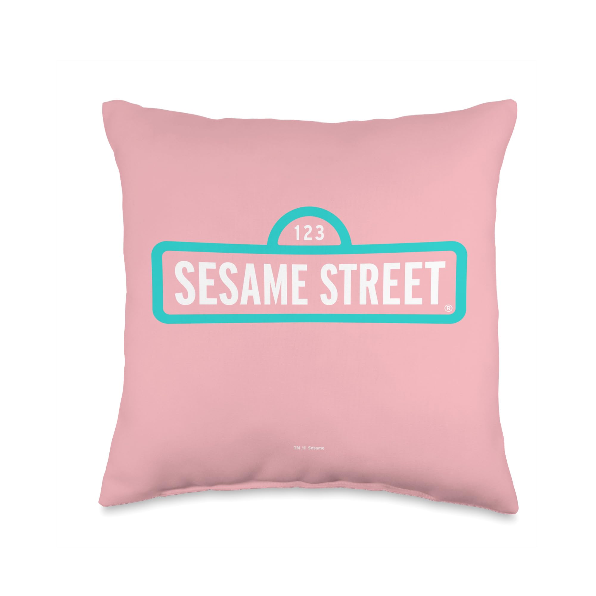 Coussin Sesame Street rose pour égayer un canapé terne avec style
