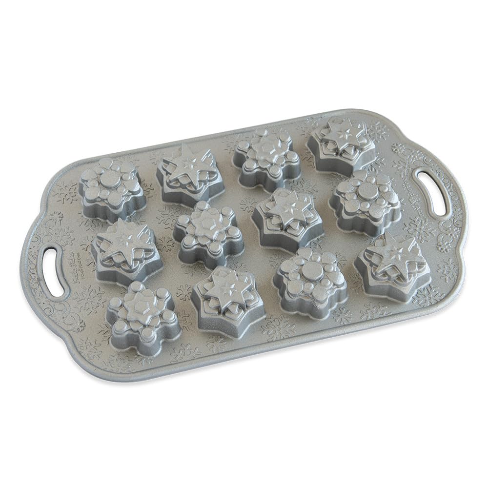 Nordic Ware - Moule à gâteau, moule à pâtisserie - Moule 12 Flocons de neige Silver - Revêtement antiadhésif - Fonte d'aluminium