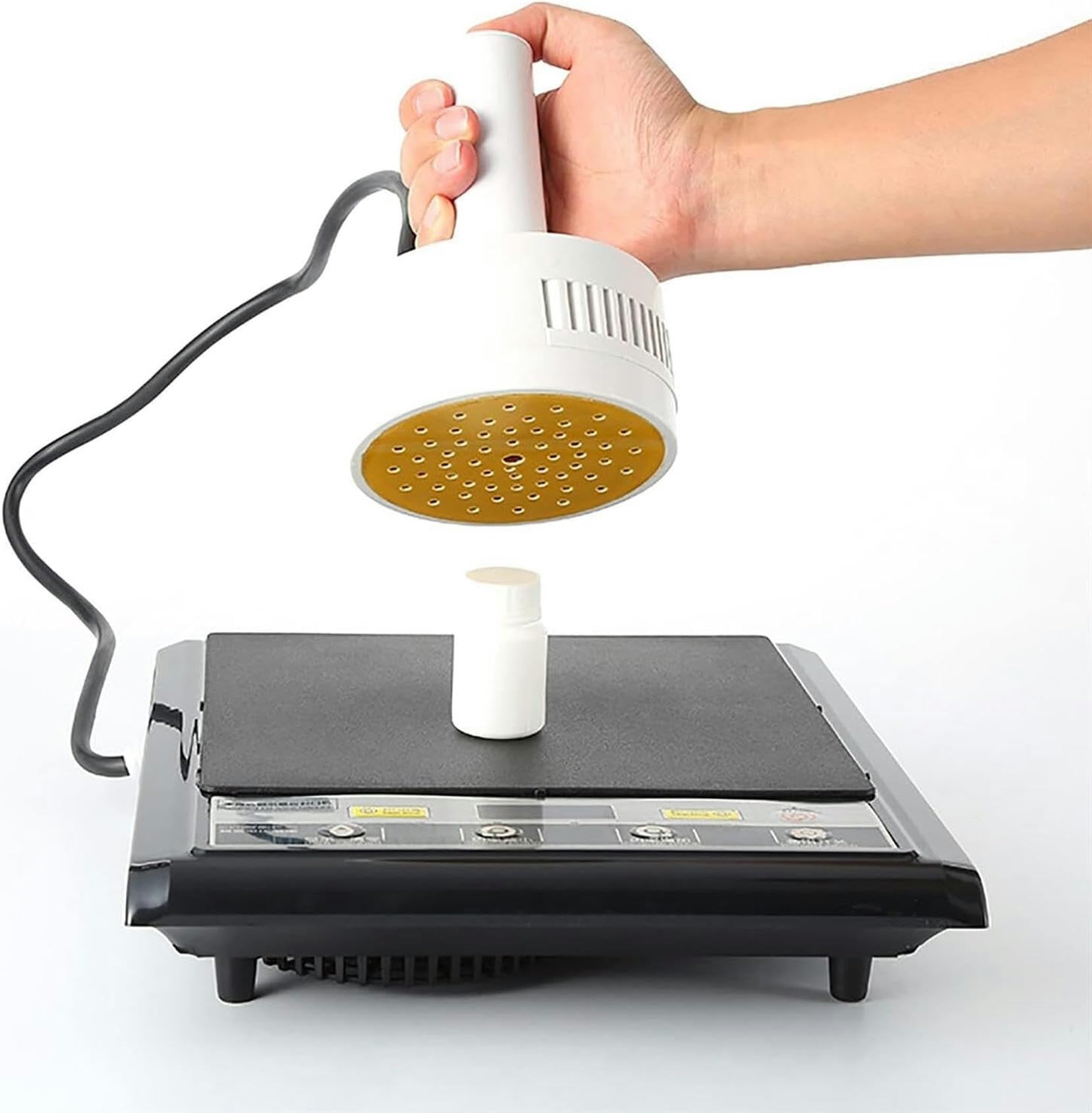 Thermoscelleuse électromagnétique portative pour étanchéité de flacons