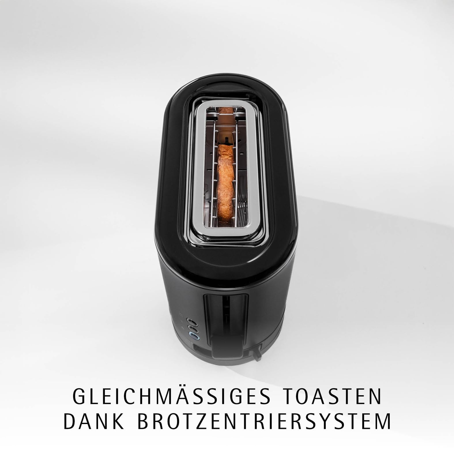 WMF Küchenminis toster 1 kromkowy z nasadką do bułek, na 1 szybę XXL, funkcja rozmrażania, toster z długim szczeliną z 7 poziomami opiekania, 600 W, stal nierdzewna, czarny matowy