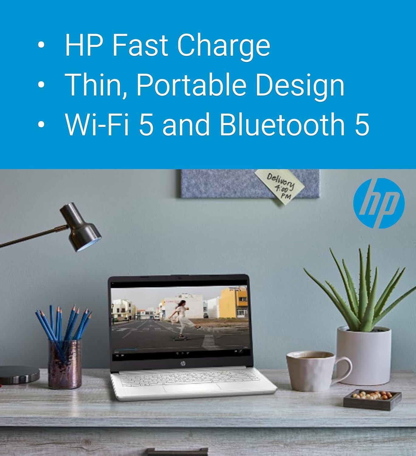 HP 14 Laptop on a desk with text highlighting features: HP Fast Charge, Thin, Portable Design, Wi-Fi 5, and Bluetooth 5.
