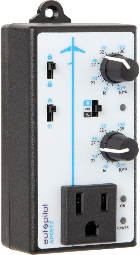 ດ້ານໜ້າ view of the Autopilot APCET2 thermostat showing two control knobs, day/night and heating/cooling switches, and a power outlet.