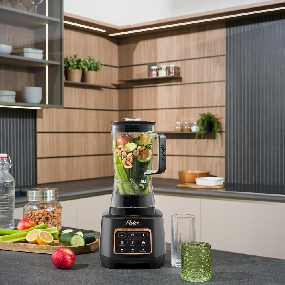 Oster XTREME MIX Professional Blender actively blending a green smoothie.