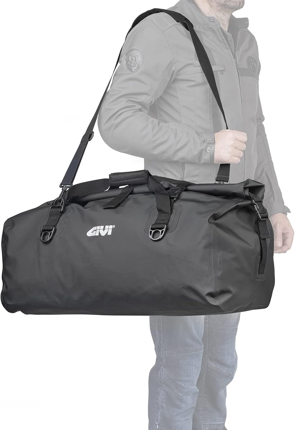 Person carrying GIVI EA126 Waterproof Bag 80 Litres with shoulder strap