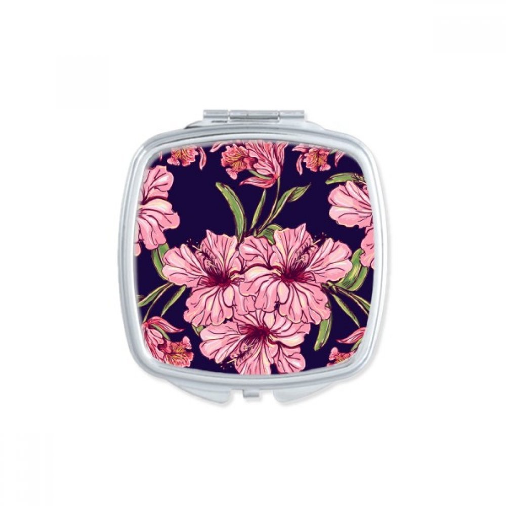 Miroir compact fleuri et oiseau parfait dans le sac à main pour les retouches au bureau