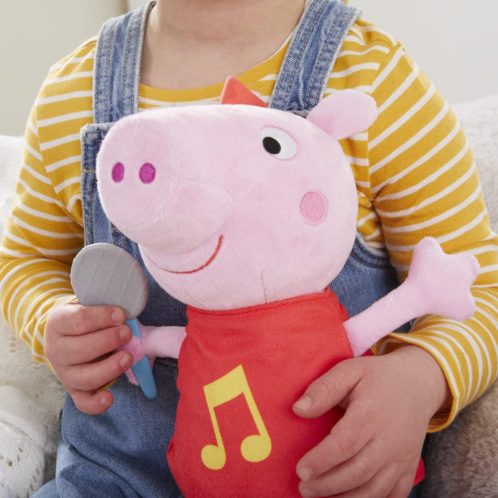 Peppa Pig Peppa Wanta, Śpiewający plusz z brokatową czerwoną sukienką i kokardą, śpiewaj 3 piosenki, od 3 lat