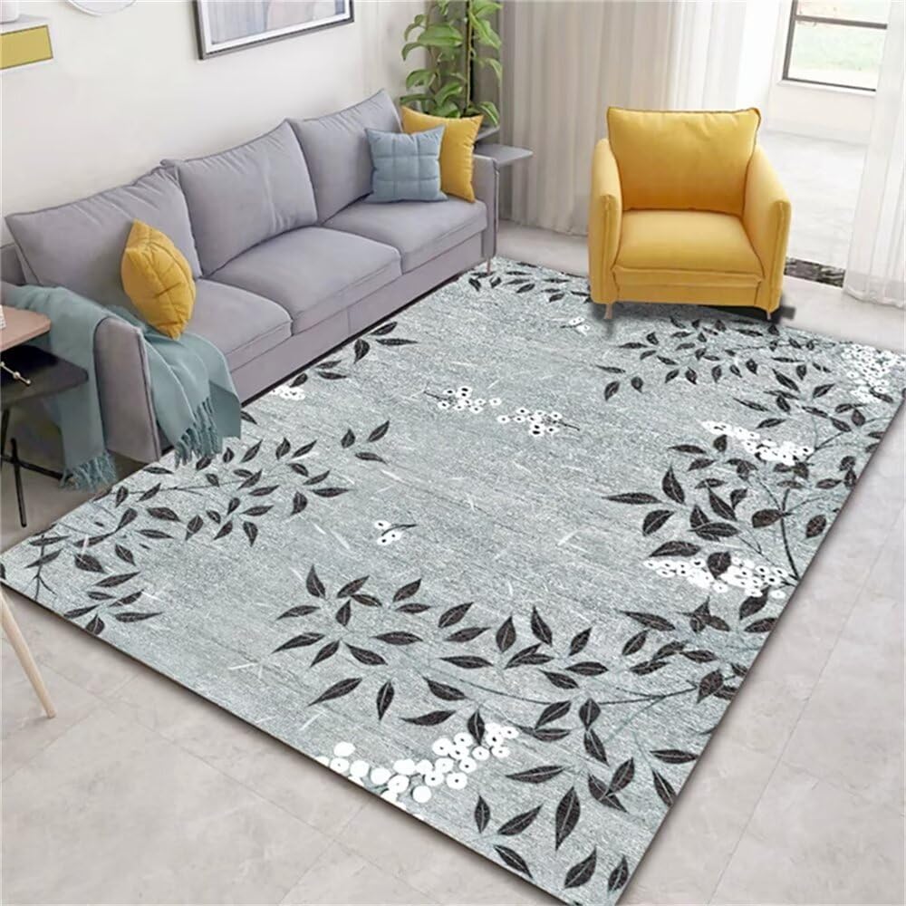 Tapis bébé rectangulaire aux finitions soignées motif feuilles 90x150