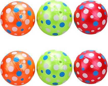 dog bouncing beach ball