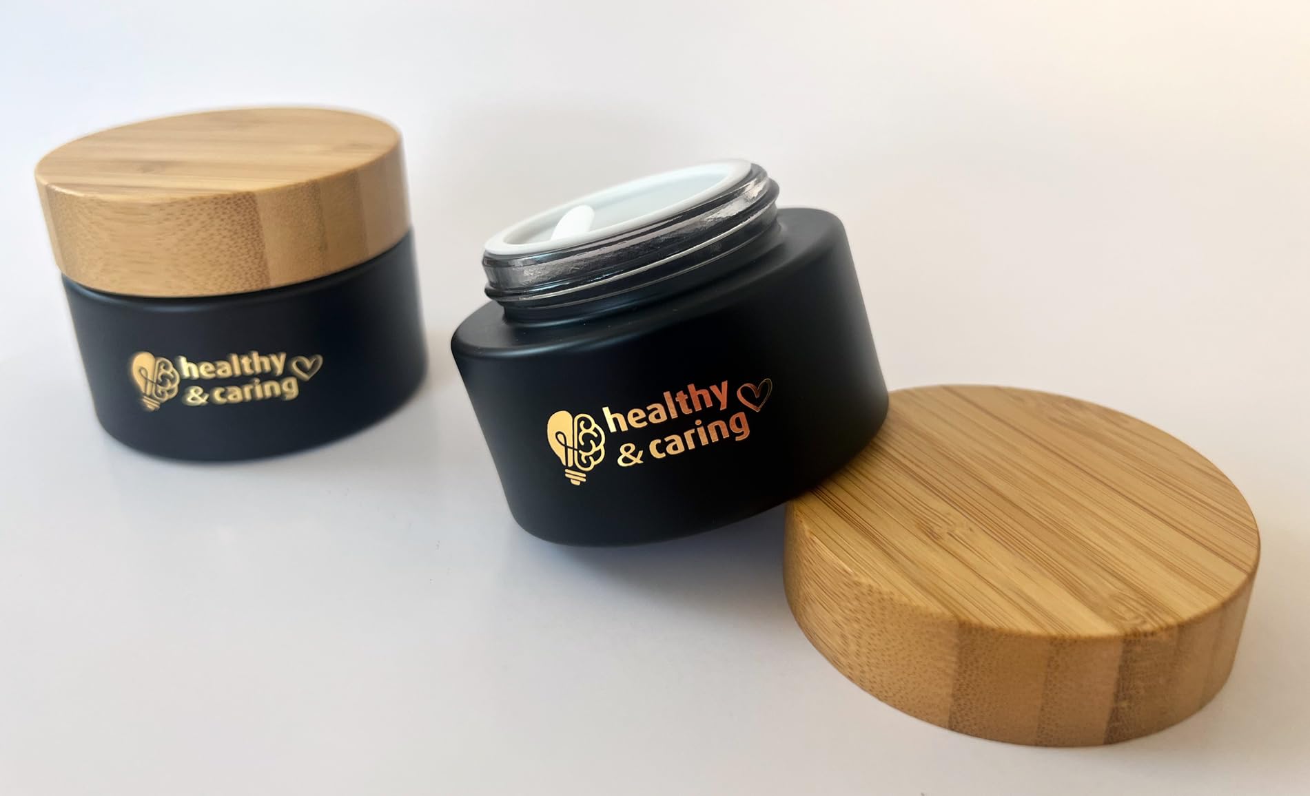 healthy & caring Black Glass Cosmetic Container (50 ml) with Bamboo Lid and Golden Emblem (2 Jars) - Image 4