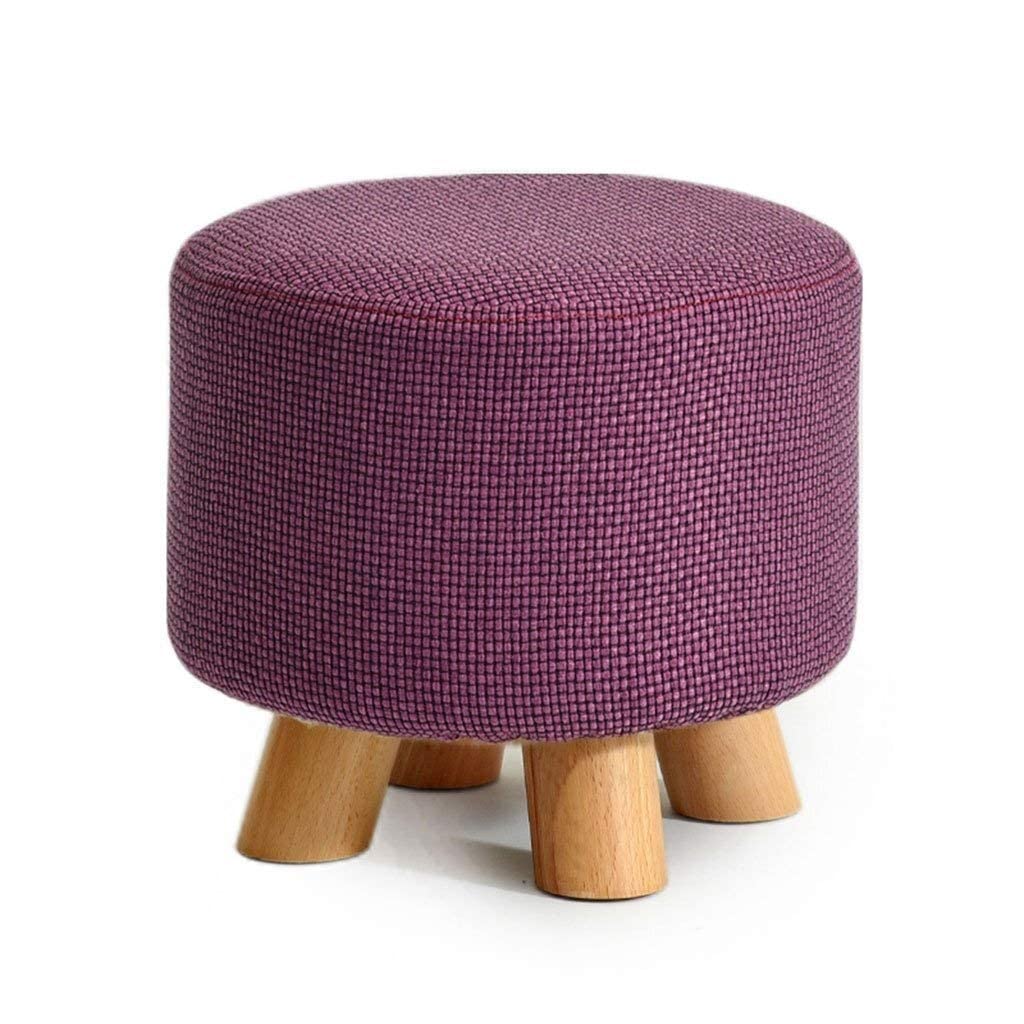 Banc en bois violet pour s'asseoir confortablement dans l'entrée