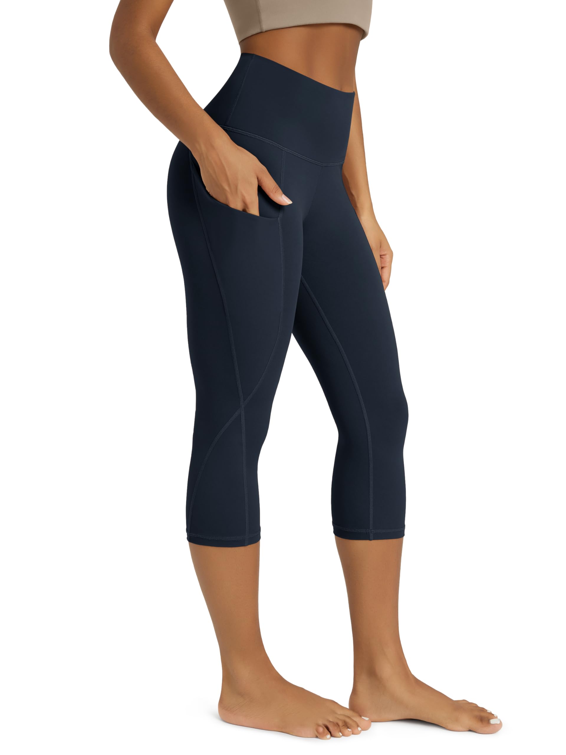 ODODOS Women's High Waisted Yoga Capris with Pockets, Tummy Control Non See Through Workout Athletic Running Capri Leggings
