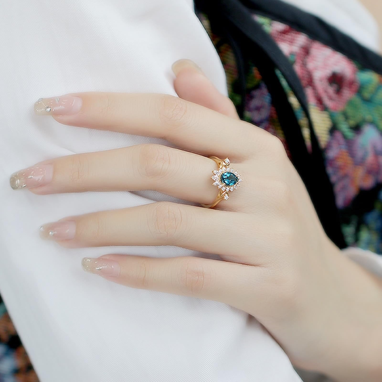 Anillo de boda de oro amarillo Au 375/585/750 con gotas de topacio azul, forma de flor