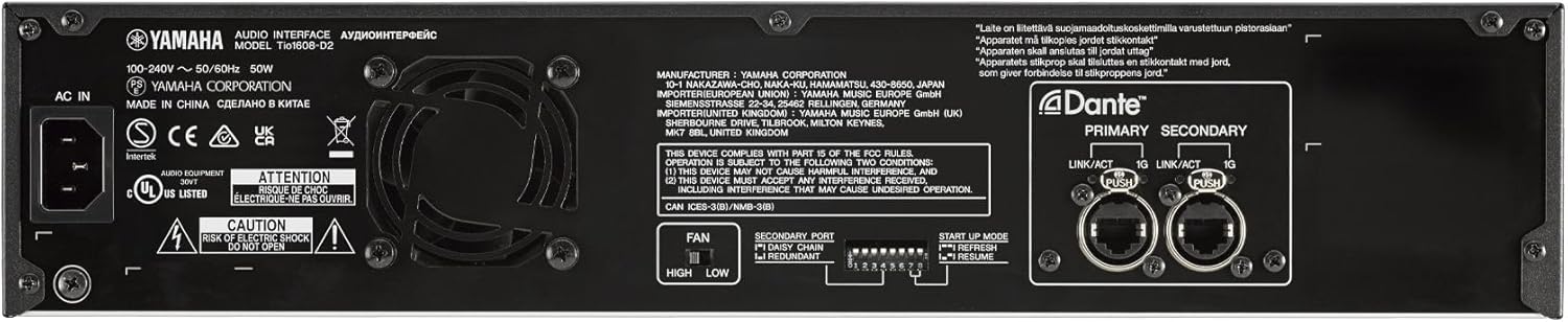 Rear view of the Yamaha Tio1608-D2 showing Dante Primary and Secondary ports, dip switches for Unit ID and Quick Config, and power input.