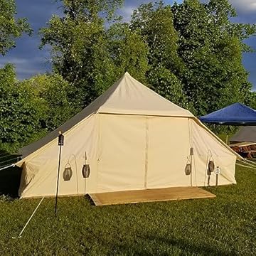 large canvas tent with stove