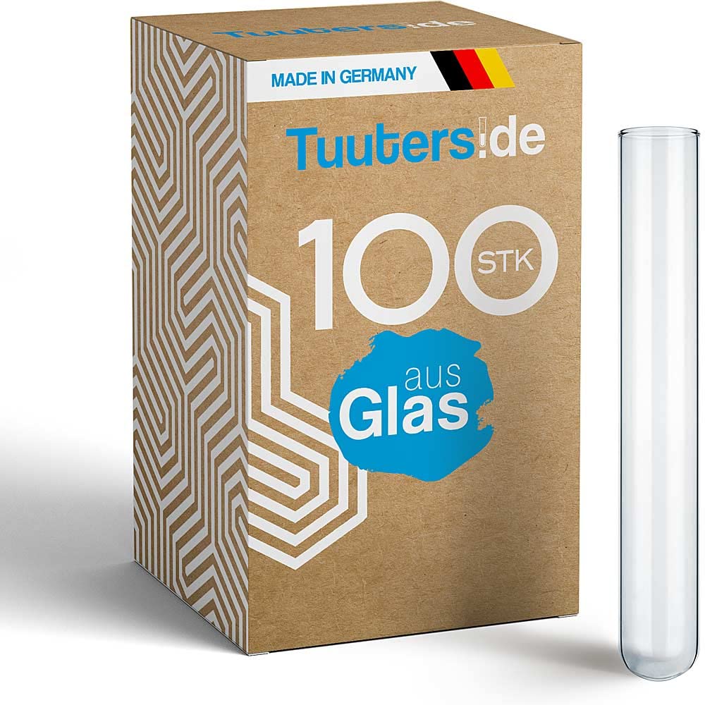 De Reageerbuizen Van Het Glas Die Met Vloeistof Worden Gevuld Stock