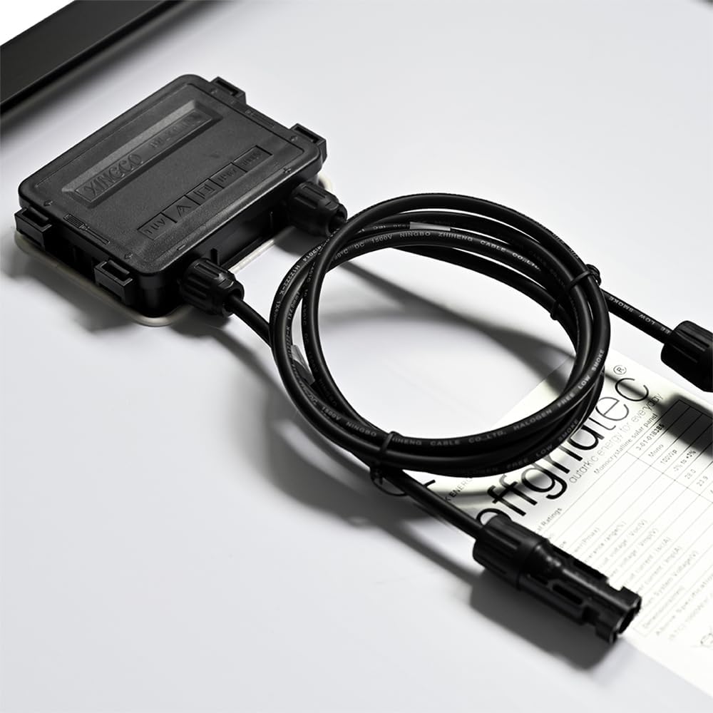 Close-up of solar panel junction box and cables