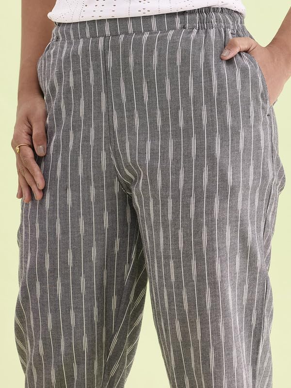 Image of GO COLORS Ikat Print Beige Printed Pencil Pant for Women | Breathable, Side Pocket