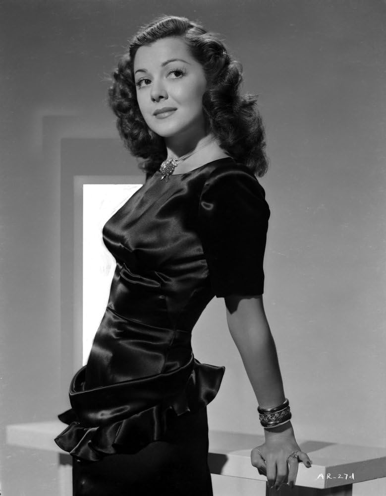 Amazon.com: Ann Rutherford Leaning on a Table Making a Cute Smile Photo ...