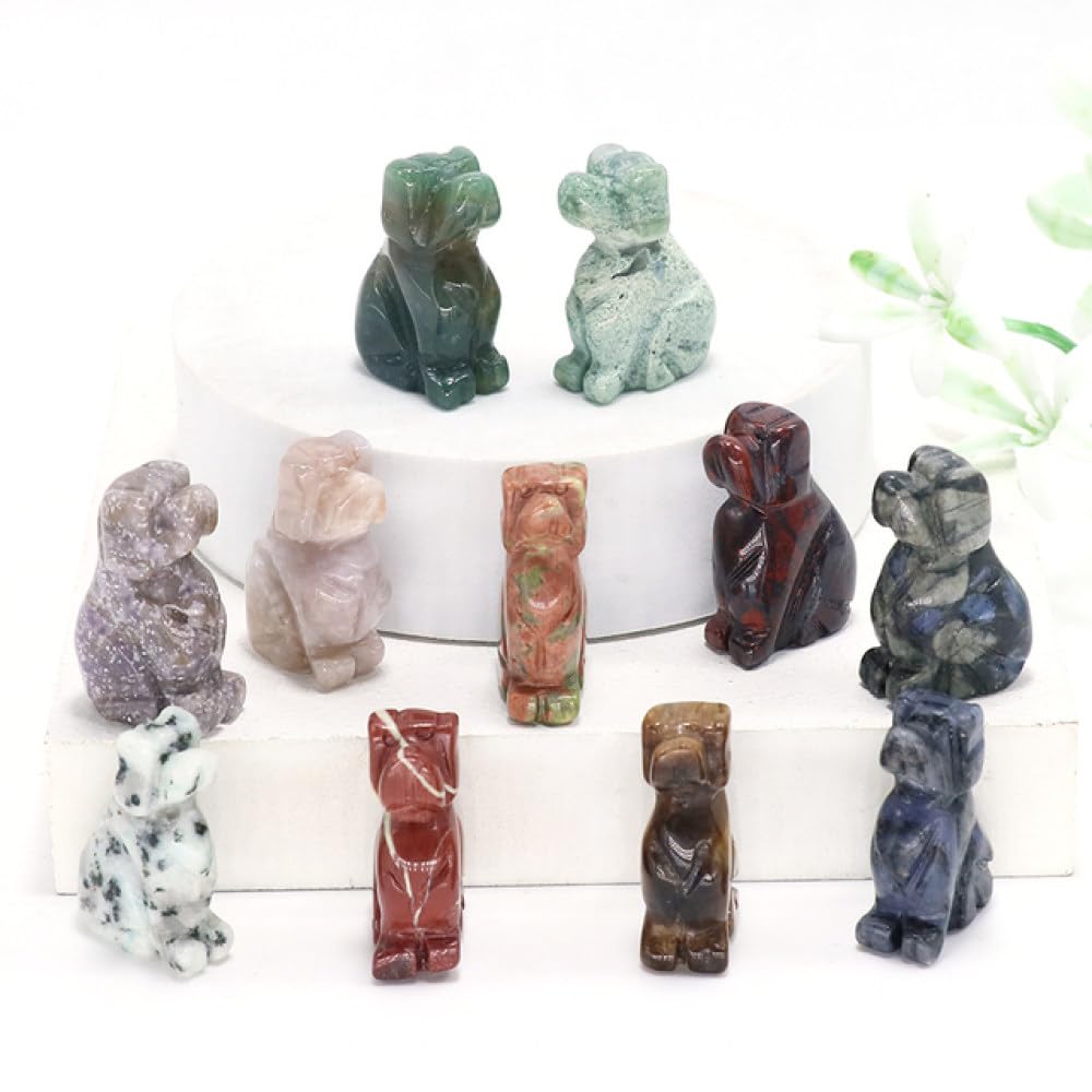 Cristal sculpté d'animal et pierres précieuses : artisanat de collection en minéraux rigoureux