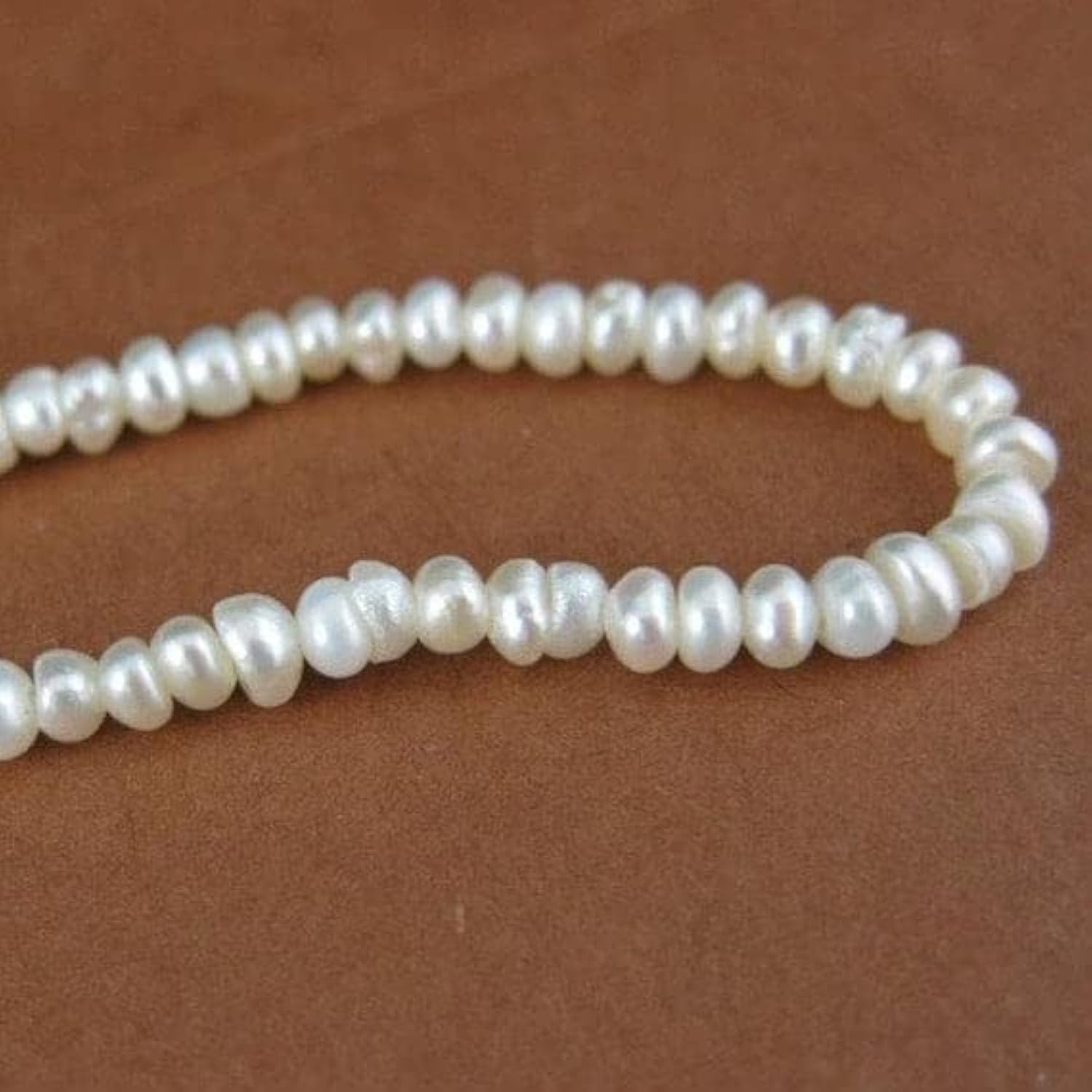 Perles de culture d'eau douce de Grade A de forme grain de sable pour joaillerie fine