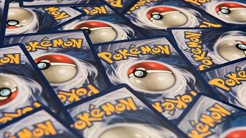 Pokemon TCG 150 Assorted Pokemon Card Lot with Foils - Free Bonus Collectors Tin Included!