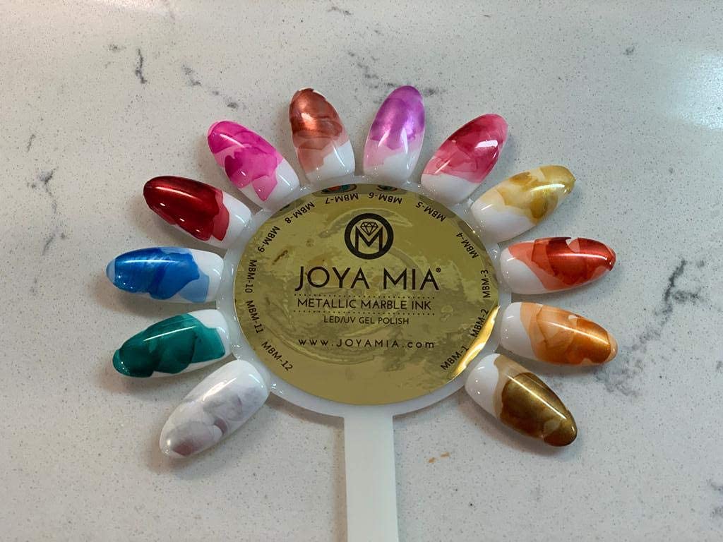 Metallic marble ink for nails by Joya Mia Metallic Marble Chrome Ink effect use marbelizer to get marble effect use over top matte or top gloss shiny for different marble effects (MBM-METALLIC-SET)