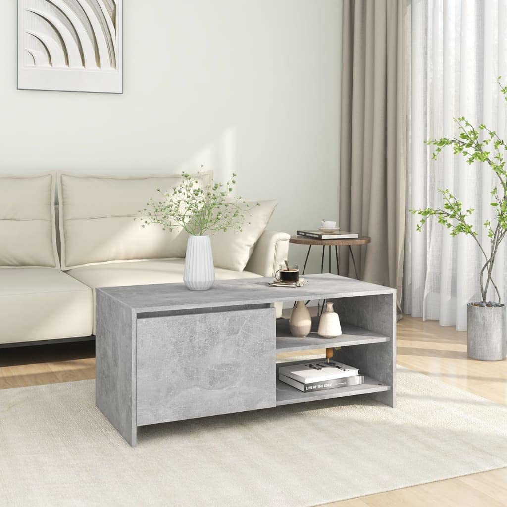 Table basse gris béton avec rangement pour optimiser votre salon moderne