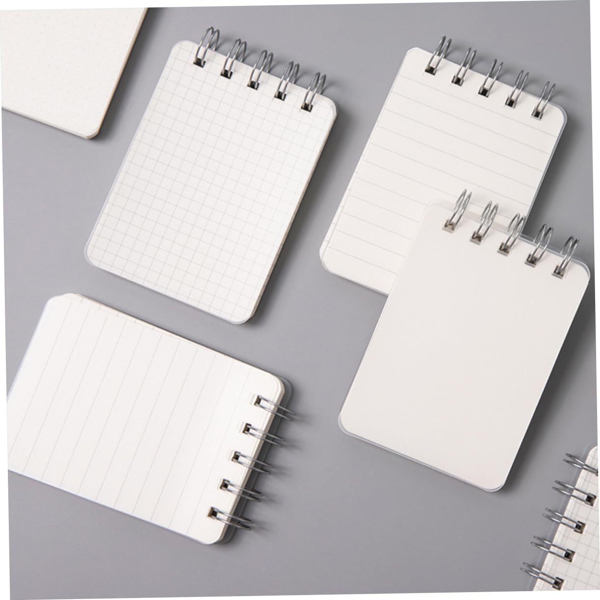 HOMSFOU 5 Ensembles Mini Ordinateur Portable Portable Doublé Cahiers À Spirale Mini Cahiers En Vrac Plaine Cahiers Pour L'école Pavé De Note Cahier Petit Papier Blanche 4 Pièces * 5