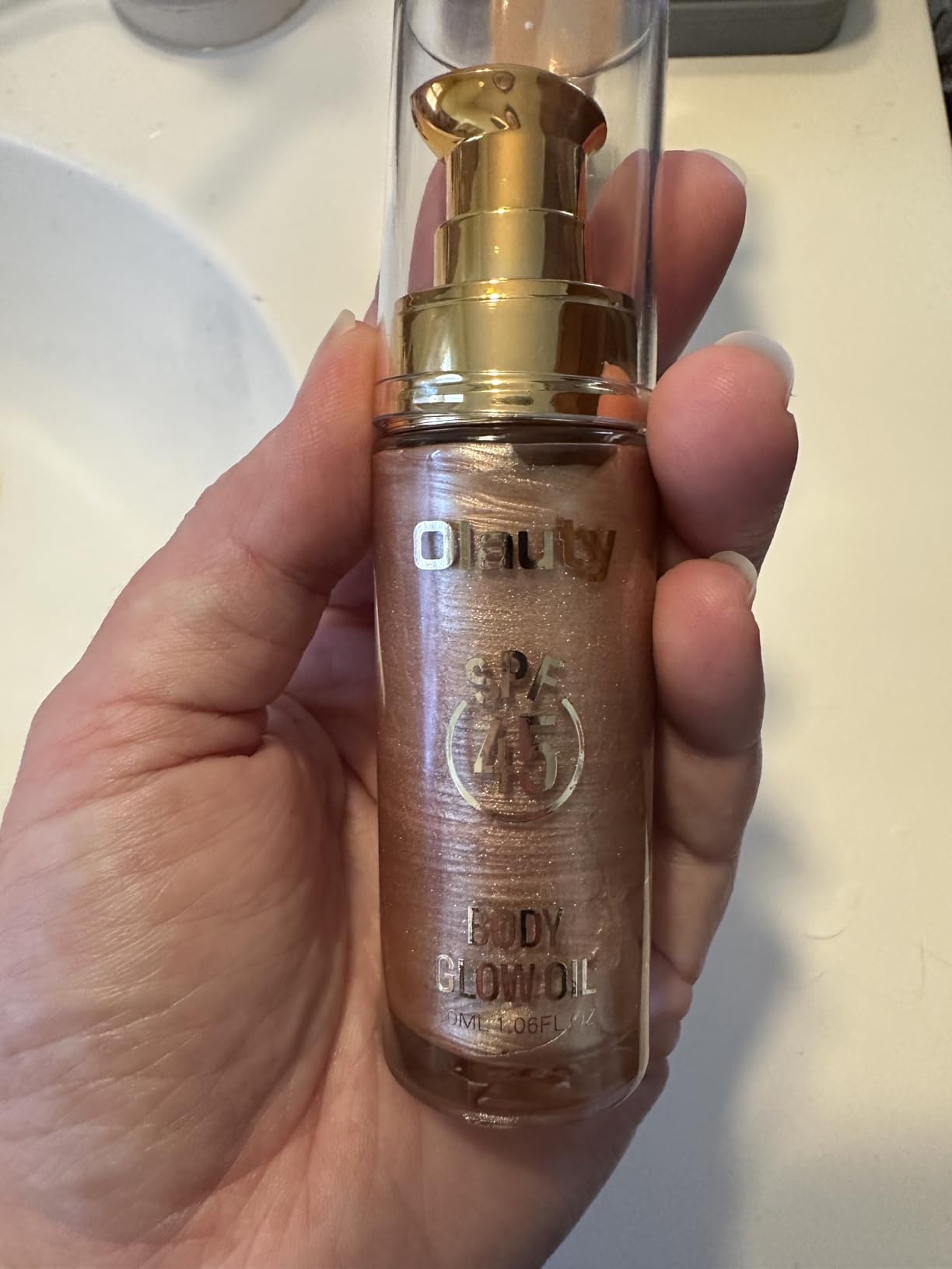 firstfly Shimmer Oil, SPF 45 Sunscreen Body Makeup Waterproof No Transfer Body Luminizer Lotion Glow for Women, Liquid Illuminator Bronzer, Long-lasting, Radiance Skin (01#Rose Gold)