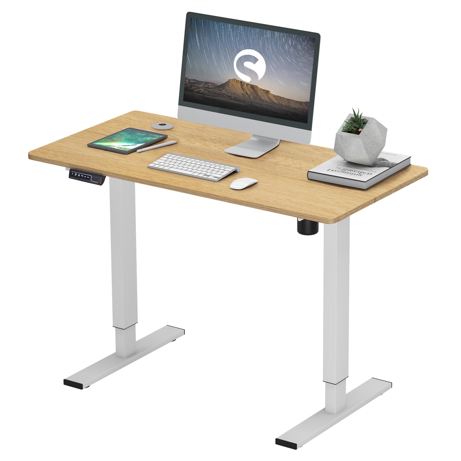 soges Electric Height Adjustable Desk in an office setting with a computer, lamp, and chair.