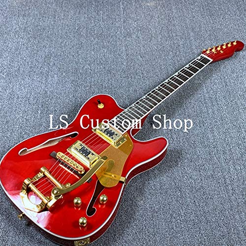 red and gold electric guitar