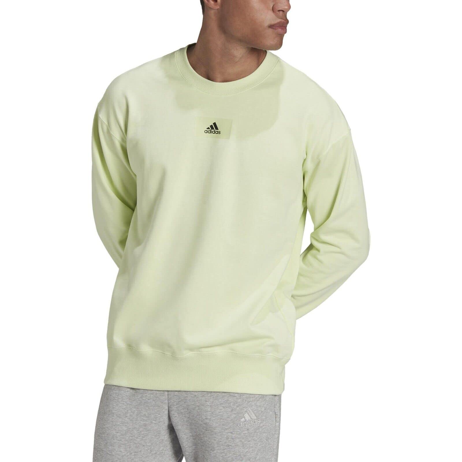 adidas Essentials FeelVivid - Sudadera con hombros caídos para hombre, casi lima