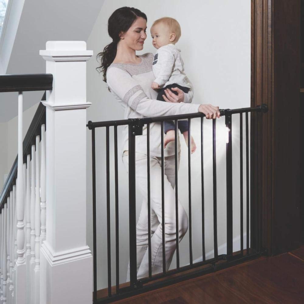 toddleroo by north states light the way baby gate: heavy duty metal gate with light sensing led for added safety. pressure or hardware mount. fits 28.75"-38.25" wide (29.3” tall, matte bronze)