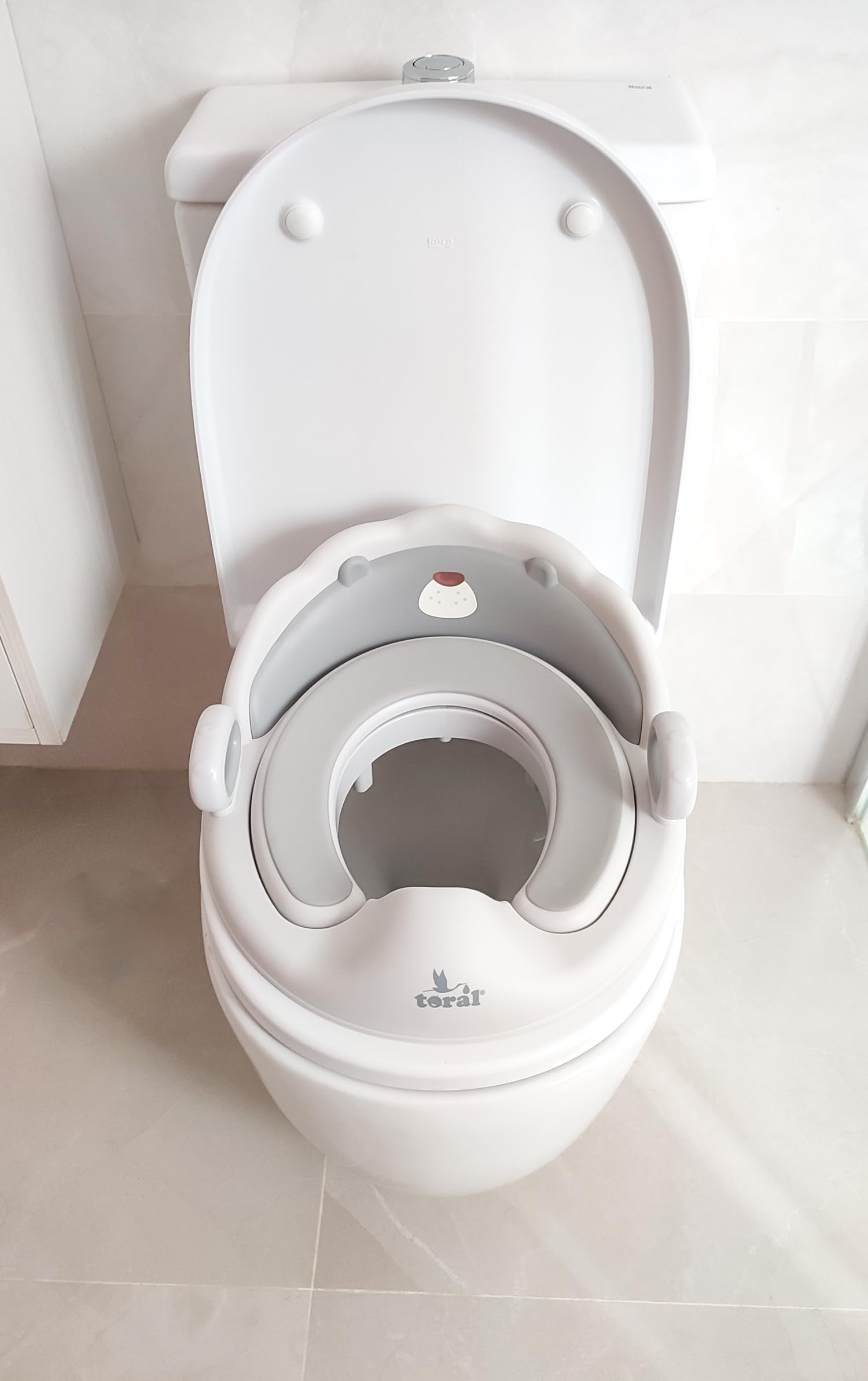 Toral Asiento Reductor con Asas para WC. Ayuda al aprendizaje de bebés y niños. Adaptador infantil portátil para váter MundiBebé +18 meses. Modelo Confort Osito